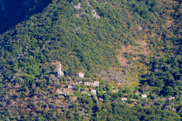 Fototapeta na wymiar Church and an old mountain village