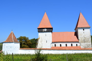 Fortified medieval saxon church in the village Merghindeal- Mergenthal, Transylvania, Romania. The...