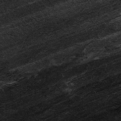 Dark grey black slate background or texture.