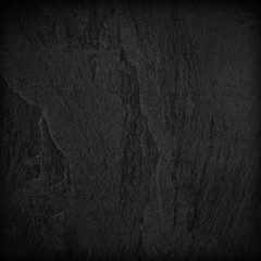 Dark grey black slate background or texture.