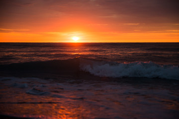 Fototapeta na wymiar Dramatic sunset over the sea