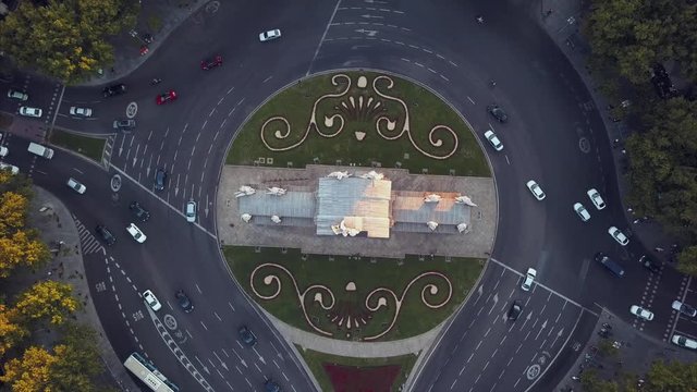 Fly over the evening Madrid with a view of the house and the road