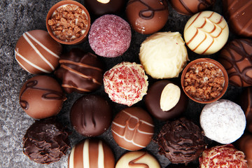 a lot of variety chocolate pralines, belgian confectionery gourmet chocolate