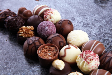 a lot of variety chocolate pralines, belgian confectionery gourmet chocolate