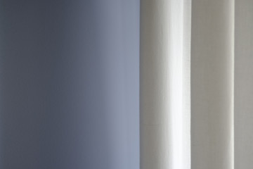 Curtain against wall