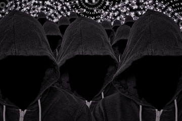Many Hooded Faceless Computer Hackers with Binary Code