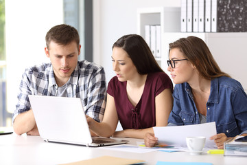 Entrepreneurs coworking at office