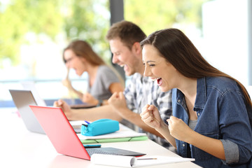 Excited classmates receiving good news