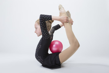Sport Concepts. Caucasian Female Rhythmic Gymnast In Professional Competitive Black Sparkling Suit...