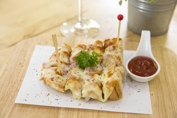 pizza bread with potato sauce on table