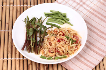 Thai popular recipe, Spicy and sour mixed vegetable salad with papaya roll call Som Tum in Thai topped french fried strick ,lentils and morning glory.