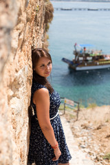 Obraz premium Woman with straight brown hair wearing dark blue dress