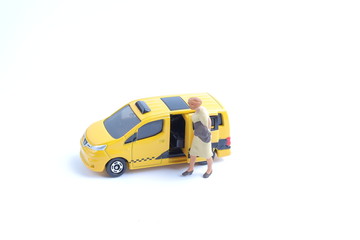small figure of taxi with white board