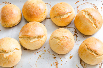 Homemade buns on baking tray ready to eating.Delicious bakery