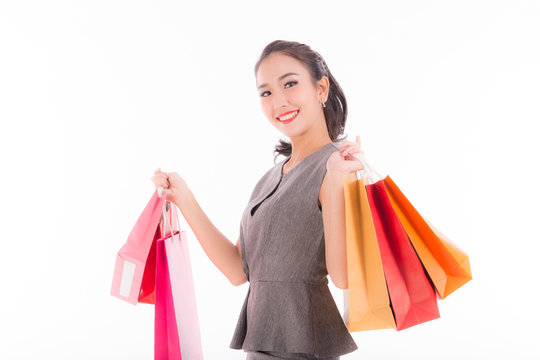 Happy Asian woman smile with shopping bags,Isolated on white background