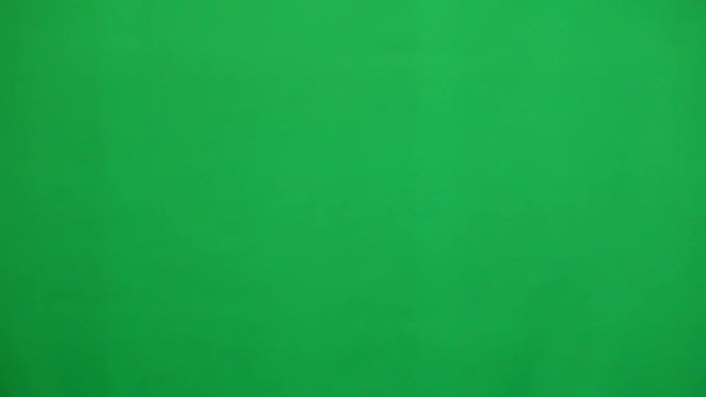 Hand gestures. Touchscreen. Female hand showing multitouch gestures in green screen