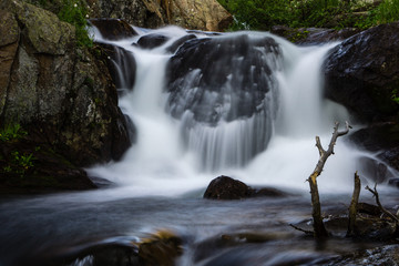 Fototapeta na wymiar Waterfall in Rocky Mountain National Park