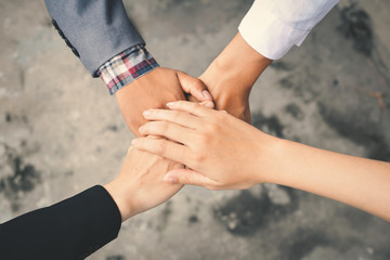 Hands of business teamwork concept together and successful