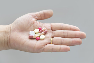 Medicine pills in doctor hand