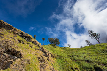 Green mountain and blue sky.
