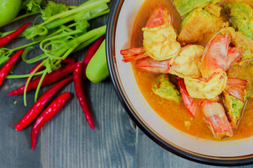 Delicious traditional Thai food, sour soup curry with Shrimp and omelet mixed Climbing Wattle (call  Cha-om ( local Thai vegetables))