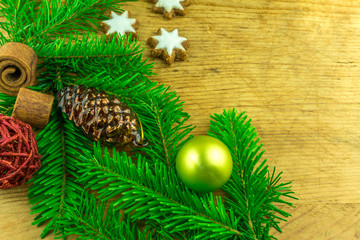 Christmas decoration with stars, Christmas balls and branches of a fir tree