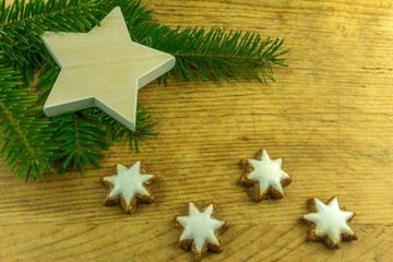 Christmas decoration with stars, Christmas balls and branches of a fir tree