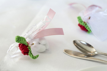 Wedding guest present gift with soap bubbles maker on table with candy for wedding ceremony