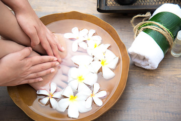 Obraz na płótnie Canvas Spa treatment and product for female feet and manicure nails spa, Thailand. Healthy Concept.