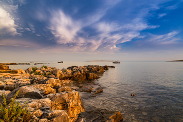 Fototapeta na wymiar Beautiful scenery on the Adriatic Sea Coast, in summer, with storm clouds, at sunset