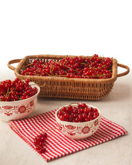 Red currant in bowls on the table
