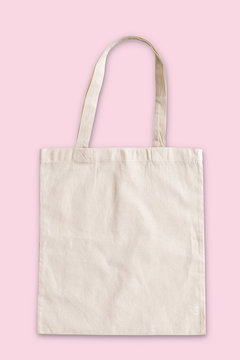 Tote bag fabric cloth shopping sack mockup isolated on pink background (clipping path)