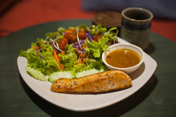 Grilled Salmon Steak with Salad