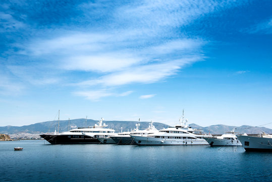 Fototapeta Luxury motorboats and yachts at the dock.Marina Zeas, Piraeus,Greece