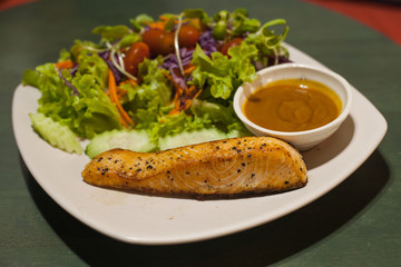 Grilled Salmon Steak with Salad