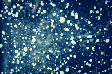 Abstract space background with white blur dots for design.