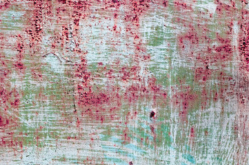 Abstract full color background for design. Classic color grunge wall texture. Peeling paint on the rusty metal surface.