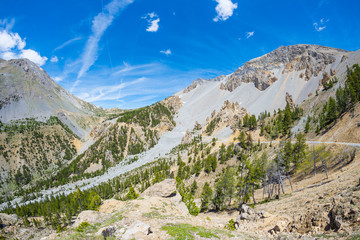 High altitude blue lake in idyllic uncontaminated environment once covered by glaciers. Summer...