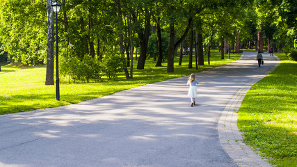 Road in the park with people
