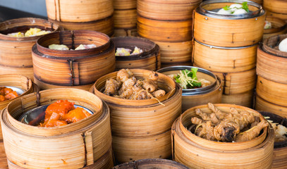Group of dim sum are steaming on the stove  Chinese restaurant that is popular in Hong Kong.