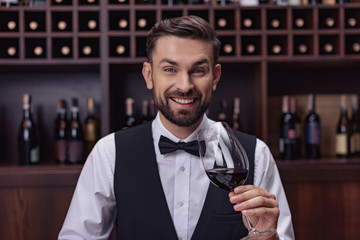 sommelier tasting wine