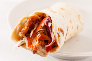 tortilla fajita wraps with meat and vegetables