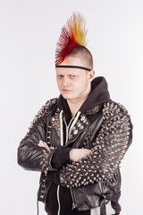 Punk rocker with Mohawk hairstyle on a white background.