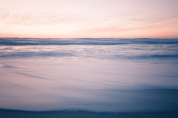 Florida Atlantic ocean beach sunset in soft pastel colors