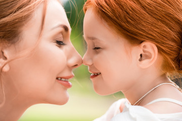 beautiful happy mother and daughter © LIGHTFIELD STUDIOS