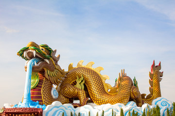 Fototapeta premium Chinese Dragon Rock Statue on sky background
