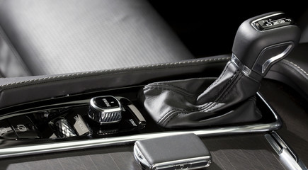 Engine start and stop button with drive mode button on a modern and luxury car. A keyless drive is possible with the modern technology key.