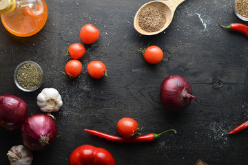 Big set organic food. Fresh raw vegetables. On a black chalkboard.