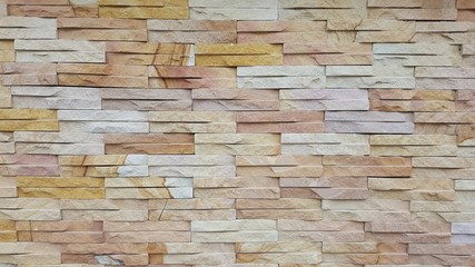 Stone wall pattern./Natural stone wall./Homes and workplaces can be designed based on nature, with red stone or brick.


