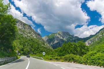 A picturesque journey along the roads of Montenegro among rocks and tunnels. The river Moraca.